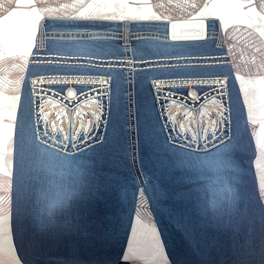 Rhinestone pocket high rise jeans size 6
